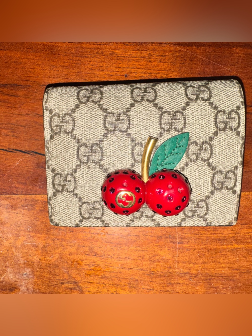 Gucci Beige GG Supreme Card Holder with Red Cherry Accent